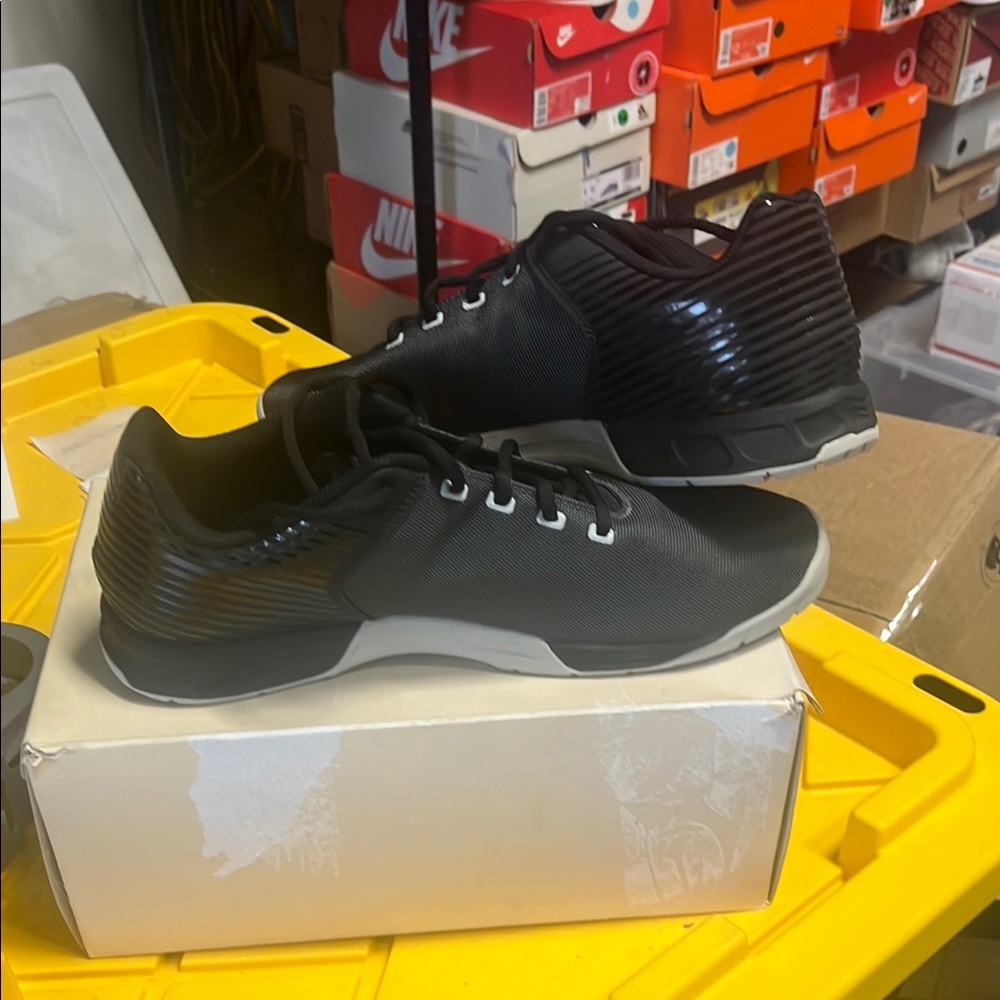 INOV-8 Black Athletic Shoes Sleek Design